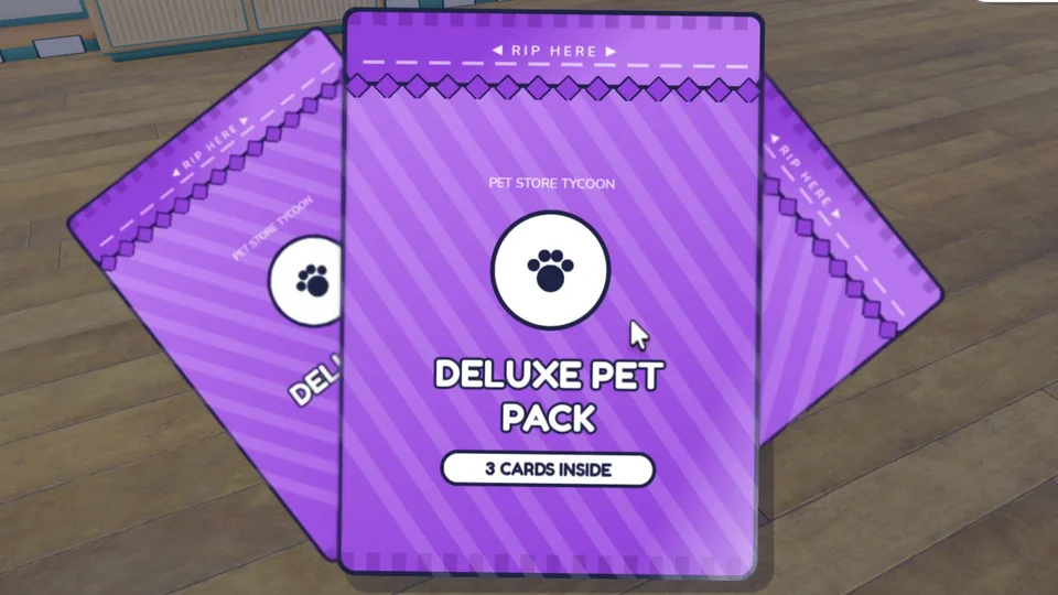 Deluxe Pet Pack cards lying on the wooden floor of a Pet Store Tycoon shop